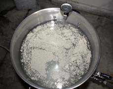 Adding yeast to the water to remove oxygen